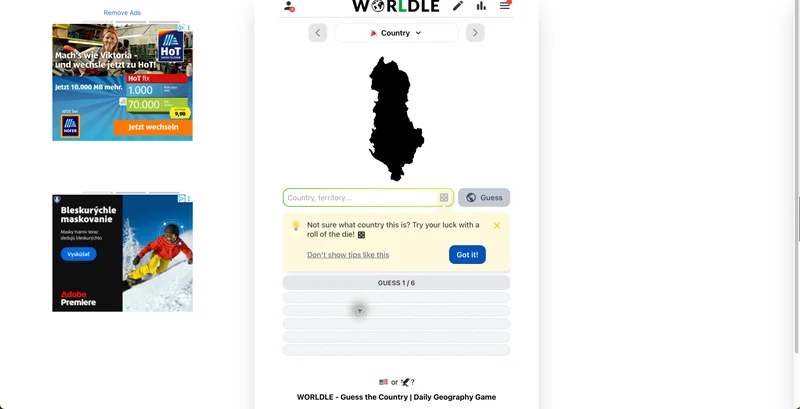 Worldle showing a black country silhouette with the guess input